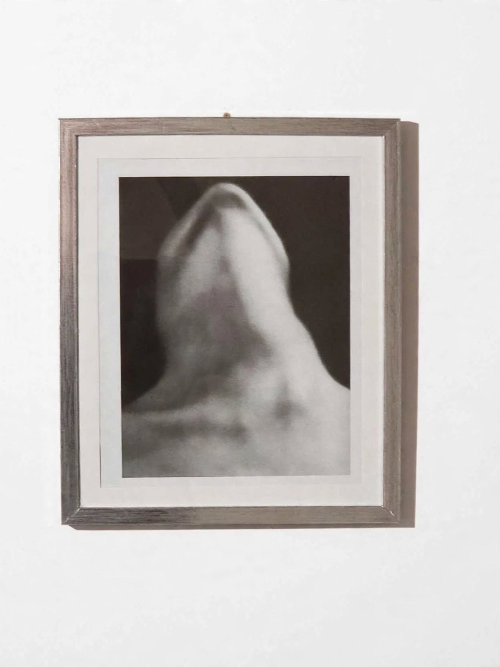 Framed copy of "The Necklace" (Anatomies), a famous 1929 print by Man Ray